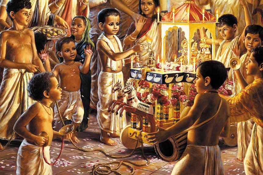 Children celebrating Ratha Yatra with a small chariot of Jagannatha